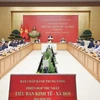 Thủ tướng Phạm Minh Chính chủ trì Phiên họp thứ nhất Tiểu ban Kinh tế-Xã hội Đại hội XIV của Đảng. (Ảnh: Dương Giang/TTXVN)