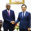 Phó Thủ tướng Trần Lưu Quang tiếp Bộ trưởng Ngoại giao Cộng hòa Benin Olushegun Adjadi Bakari. (Ảnh: Lâm Khánh/TTXVN)