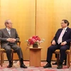Thủ tướng Phạm Minh Chính tiếp cựu Thủ tướng Nhật Bản Yasuo Fukuda. (Ảnh: Dương Giang/TTXVN)