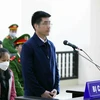 Bị cáo Hoàng Văn Hưng, cựu cán bộ Công an khai báo trước tòa. (Ảnh: Phạm Kiên/TTXVN)