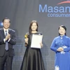 Đại diện doanh nghiệp nhận vinh danh Thương hiệu Vàng Thành phố Hồ Chí Minh tại sự kiện. (Ảnh: Mỹ Phương/TTXVN)
