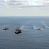 Các tàu quân sự tham gia cuộc tập trận chung Mỹ-Nhật-Hàn ở vùng biển ngoài khơi đảo Jeju của Hàn Quốc, ngày 26/11/2023. (Ảnh: Yonhap/TTXVN)