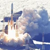 Tên lửa đẩy H2-A mang theo Tàu đổ bộ thông minh thăm dò Mặt Trăng (SLIM) được phóng lên từ Trung tâm Vũ trụ Tanegashima, miền Nam Nhật Bản, ngày 7/9/2023. (Ảnh: Kyodo/TTXVN)