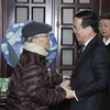 Chủ tịch nước Võ Văn Thưởng đến thăm, chúc Tết nguyên Chủ tịch nước Trần Đức Lương. (Ảnh: Thống Nhất/ TTXVN)