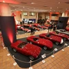 Các mẫu xe của hãng Ferrari được trưng bày tại triển lãm ở Monaco. (Ảnh: AFP/TTXVN)
