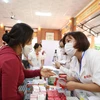 Tư vấn, cấp thuốc miễn phí cho người dân trên địa bàn huyện Cư M’gar, tỉnh Đắk Lắk. (Ảnh: Tuấn Anh/TTXVN)