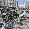 Hiện trường một vụ đánh bom tại thủ đô Mogadishu, Somalia. (Ảnh: AFP/TTXVN)