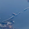 Hiện trường vụ sập cầu Francis Scott Key ở thành phố Baltimore, bang Maryland (Mỹ), sau khi bị tàu chở hàng đâm trúng, ngày 31/3/2024. (Ảnh: AFP/TTXVN)