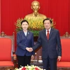 Trưởng Ban Nội chính Trung ương Phan Đình Trạc tiếp Bộ trưởng Tư pháp Trung Quốc Hạ Vinh đang thăm và làm việc tại Việt Nam. (Ảnh: Phương Hoa/TTXVN)