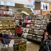 Người dân mua sắm tại siêu thị ở Seoul, Hàn Quốc. (Ảnh: AFP/TTXVN)