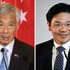 Thủ tướng Singapore Lý Hiển Long (trái) và Phó Thủ tướng Lawrence Wong. (Ảnh: AFP/TTXVN)