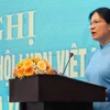 Bà Hà Thị Nga, Chủ tịch Hội Liên hiệp Phụ nữ Việt Nam, phát biểu tại Hội nghị. (Ảnh: Thu Hương/TTXVN)