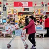 Người dân mua sắm tại một siêu thị ở Canberra, Australia. (Ảnh: AFP/TTXVN)