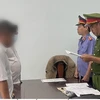 Cơ quan điều tra tống đạt quyết định lệnh bắt tạm giam đối với bị can Nguyễn Văn Thắng. (Ảnh: TTXVN phát)