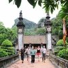 Đền thờ Vua Đinh Tiên Hoàng, nơi lưu dấu nhiều giá trị văn hóa, lịch sử, nghệ thuật kiến trúc, tâm linh, thu hút khách quốc tế đến tham quan. (Ảnh: Minh Đức/TTXVN)