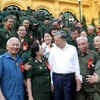 Chủ tịch nước Tô Lâm gặp mặt thân mật các đại biểu. (Ảnh: Nhan Sáng/TTXVN)