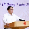 Thủ tướng Phạm Minh Chính phát biểu tại điểm cầu Chính phủ. (Ảnh: Dương Giang/TTXVN)