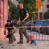Lực lượng an ninh Israel điều tra tại hiện trường vụ nổ ở Tel Aviv ngày 19/7/2024. (Ảnh: Getty Images/TTXVN)