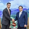 Thủ tướng Phạm Minh Chính tiếp Quốc vụ khanh phụ trách Thương mại quốc tế UAE Thani bin Ahmed Al Zeyoudi. (Ảnh: Dương Giang/TTXVN)