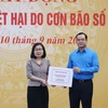 Thông tấn xã Việt Nam ủng hộ đồng bào bị thiệt hại do cơn bão số 3. (Ảnh: Phương Hoa/TTXVN)