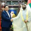 Thủ tướng Phạm Minh Chính hội đàm với Phó Tổng thống, Thủ tướng UAE Sheikh Mohammed bin Rashid Al Maktoum. (Ảnh: Dương Giang/TTXVN)