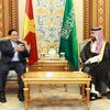 Thủ tướng Phạm Minh Chính gặp Hoàng Thái tử kiêm Thủ tướng Vương quốc Saudi Arabia Mohammed Bin Salman. (Ảnh: Dương Giang/TTXVN)