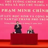 Thủ tướng Phạm Minh Chính tại cuộc gặp lưu học sinh và cộng đồng người Việt Nam tại thành phố Trùng Khánh, Trung Quốc. (Ảnh: Dương Giang/TTXVN)