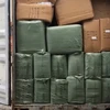 Container chứa hàng giả mạo xuất xứ ở Việt Nam. (Ảnh: TTXVN phát)