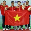 Các võ sĩ Việt Nam đoạt Huy chương Vàng nội dung đòn tấn công nam. (Ảnh: Quang Nhựt/TTXVN)