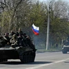 [Video] Xe bọc thép quân đội Ukraine bỏ sang quân ly khai