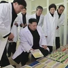 [Photo] Ông Kim Jong Un thị sát tại nhà máy sản xuất thực phẩm