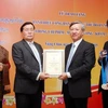 Hà Nội trao tặng Danh hiệu Công dân danh dự cho công dân Lào