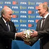Tổng thống Nga Putin và Chủ tịch FIFA Sepp Blatter. (Nguồn: AP)