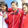 Ánh Viên (giữa) đã thi đấu hết các nội dung ở SEA Games 28. (Ảnh: Quốc Khánh/TTXVN)