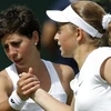 Carla Suarez Navarro (trái) thua sốc ở này ra quân. (Nguồn: AFP)