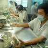 Nuôi cấy mô thực vật tại Trung tâm Công nghệ sinh học Thành phố Hồ Chí Minh. (Ảnh: Mạnh Linh/TTXVN)