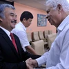 Ông Rolando Alfonso (bên phải), Trưởng Ban Tư tưởng Ban chấp hành Trung ương Đảng Cộng sản Cuba tiếp Phó Tổng Giám đốc Nguyễn Hoài Dương. (Ảnh: Lê Hà​/TTXVN​)