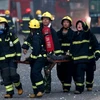 Lính cứu hỏa trong vụ nổ ở Thiên Tân, Trung Quốc. (Nguồn: cctv-america)