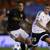 Monaco (áo đen) liệu có ngược dòng thành công trước Valencia? (Nguồn: Getty Images)
