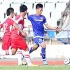 U19 Việt Nam (áo xanh) ở trận giao hữu với U19 Lào. (Ảnh: Minh Chiến/Vietnam+)
