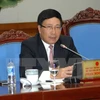 Phó Thủ tướng, Bộ trưởng Bộ Ngoại giao Phạm Bình Minh phát biểu tại Lễ ra mắt Ủy ban Quốc gia APEC 2017. (Ảnh: Doãn Tấn/TTXVN)