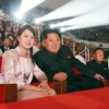Ông Kim Jong-un và phu nhân Ri Sol-ju xem hòa nhạc. (Nguồn: EPA)