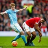 Kevin de Bruyne đối đầu Anthony Martial. (Nguồn: Getty Images)