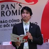 Ông Mikio Masawaki giới thiệu với các nhà báo về chiến lược mới của bia Sapporo. (Ảnh: Hà Huy Hiệp/Vietnam+)
