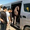 13 lao động Việt Nam tại Algeria về nước. (Ảnh: Thanh Bình/Vietnam+)