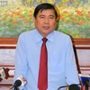 Ông Nguyễn Thành Phong, tân Chủ tịch UBND Thành phố Hồ Chí Minh nhiệm kỳ 2011-2016 trả lời phỏng vấn báo chí. (Ảnh: Hoàng Hải/TTXVN)