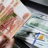 Đồng ruble đứng ở mức 72,46 ruble đổi 1 USD. (Nguồn: Sputnik)