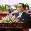 Ông Lê Minh Hoan phát biểu tại phiên bế mạc Đại hội đại biểu Đảng bộ tỉnh Đồng Tháp lần thứ X. (Ảnh: Văn Trí/TTXVN)
