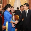 Chủ tịch nước Trương Tấn Sang với các đại biểu. (Ảnh: Nguyễn Khang/TTXVN)