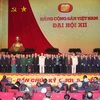 Tổng Bí thư Nguyễn Phú Trọng cùng Ban Chấp hành Trung ương khóa XII ra mắt Đại hội. (Ảnh: TTXVN)